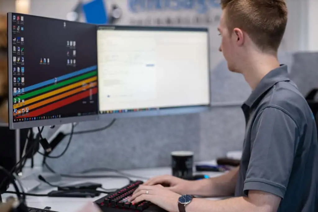 Envisage Technology employee working on a computer