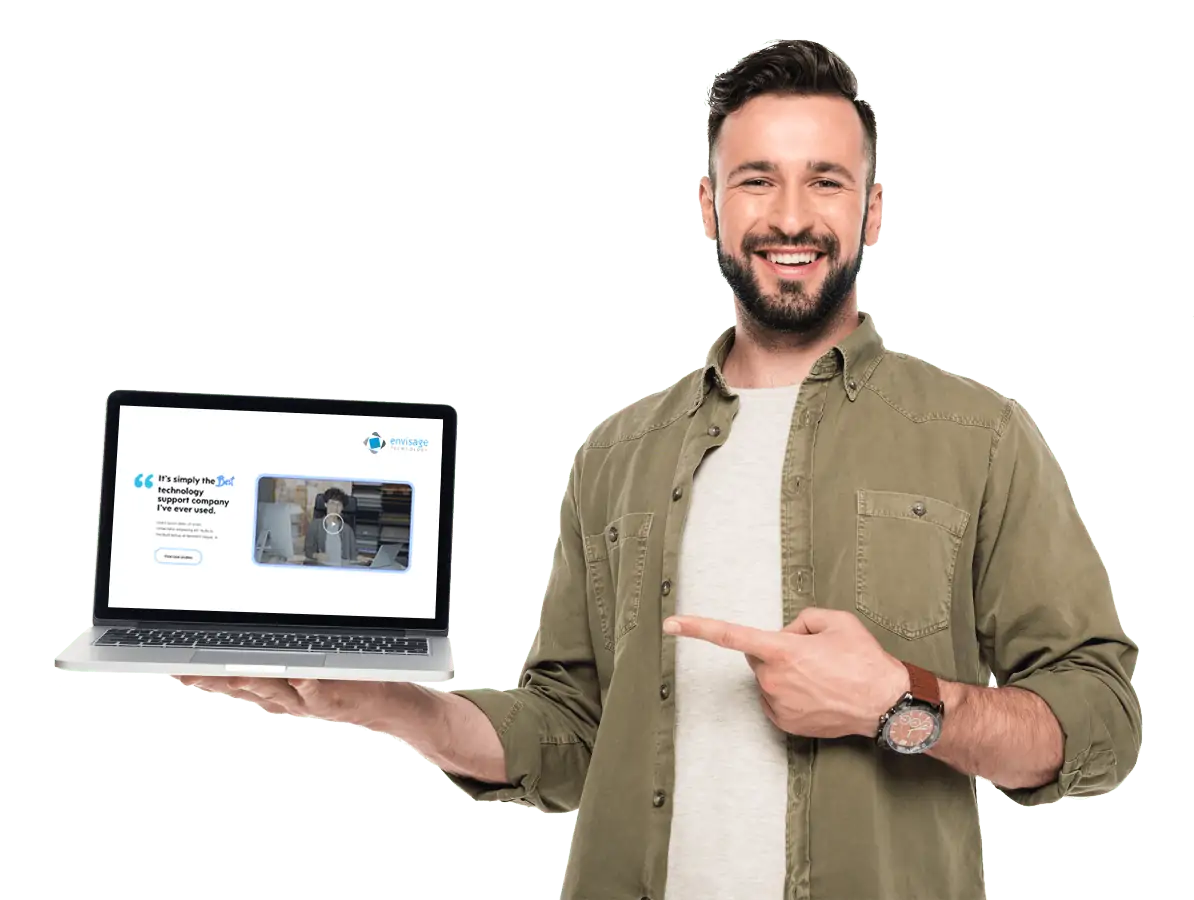 Envisage Technology man holding laptop and smiling