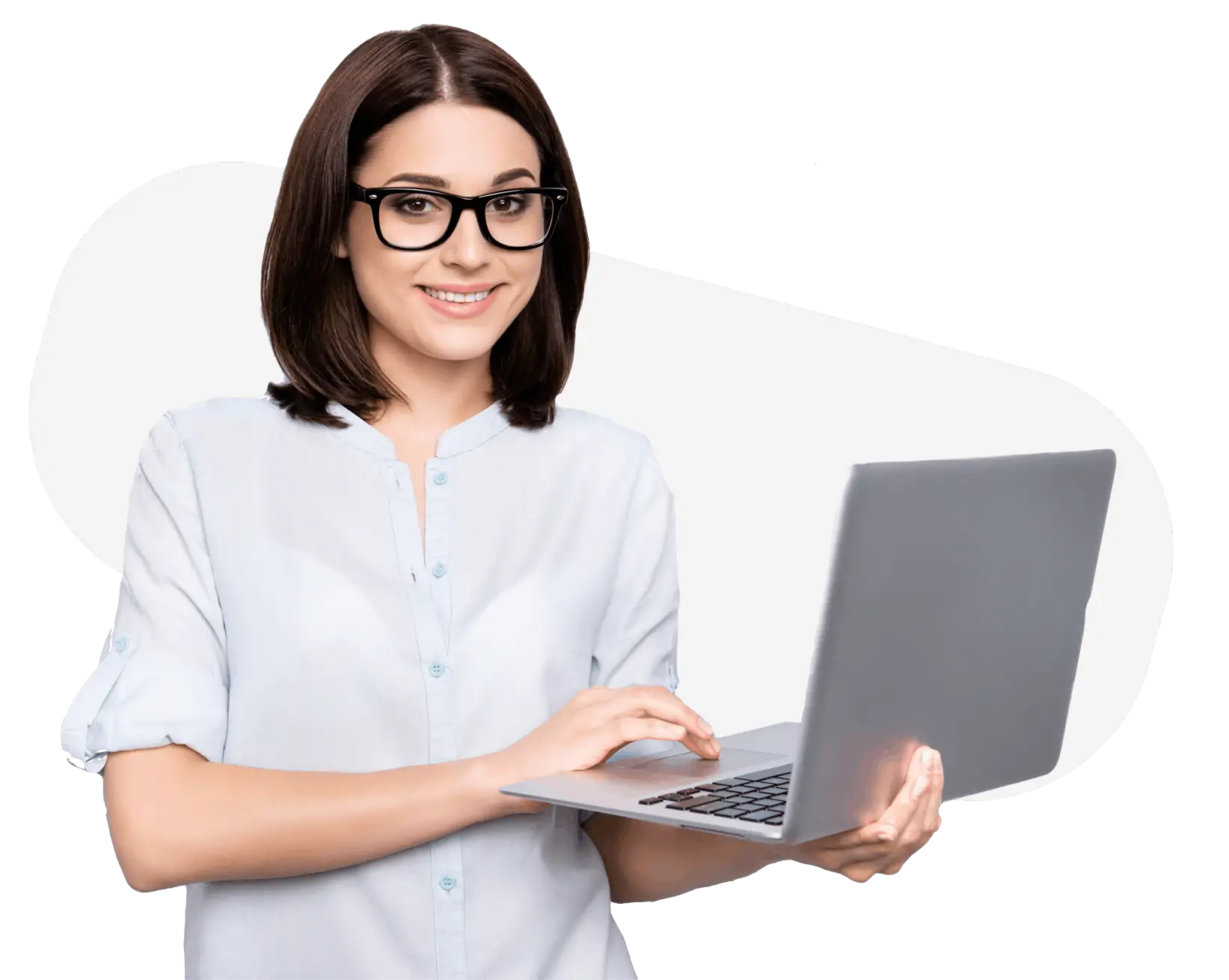 woman wearing glasses and a shirt holding a silver laptop